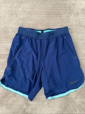 Nike Men’s Royal Blue Running Shorts with Teal Trim